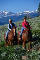 Horseback riding in mountains; Size=130 pixels wide